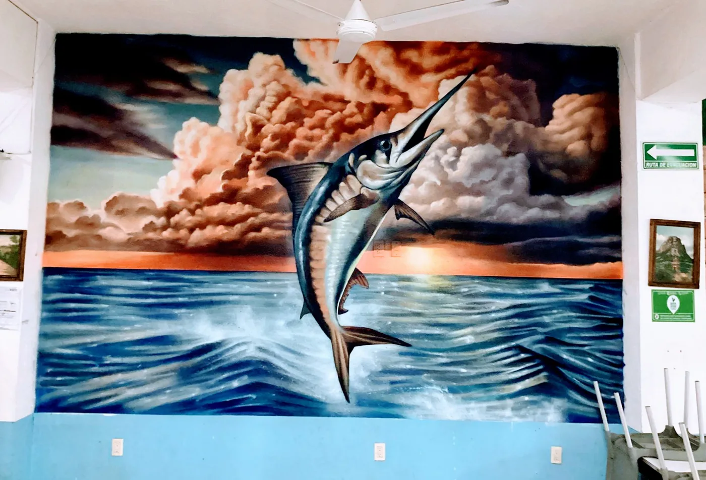 Artistas Urbanos pintan mural; al interior del Restaurante “Mariscos Felos”, en SJR.